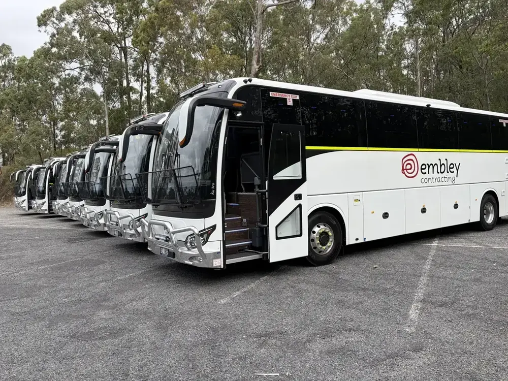 Fleet of crew coaches staged for a mine-site crew change