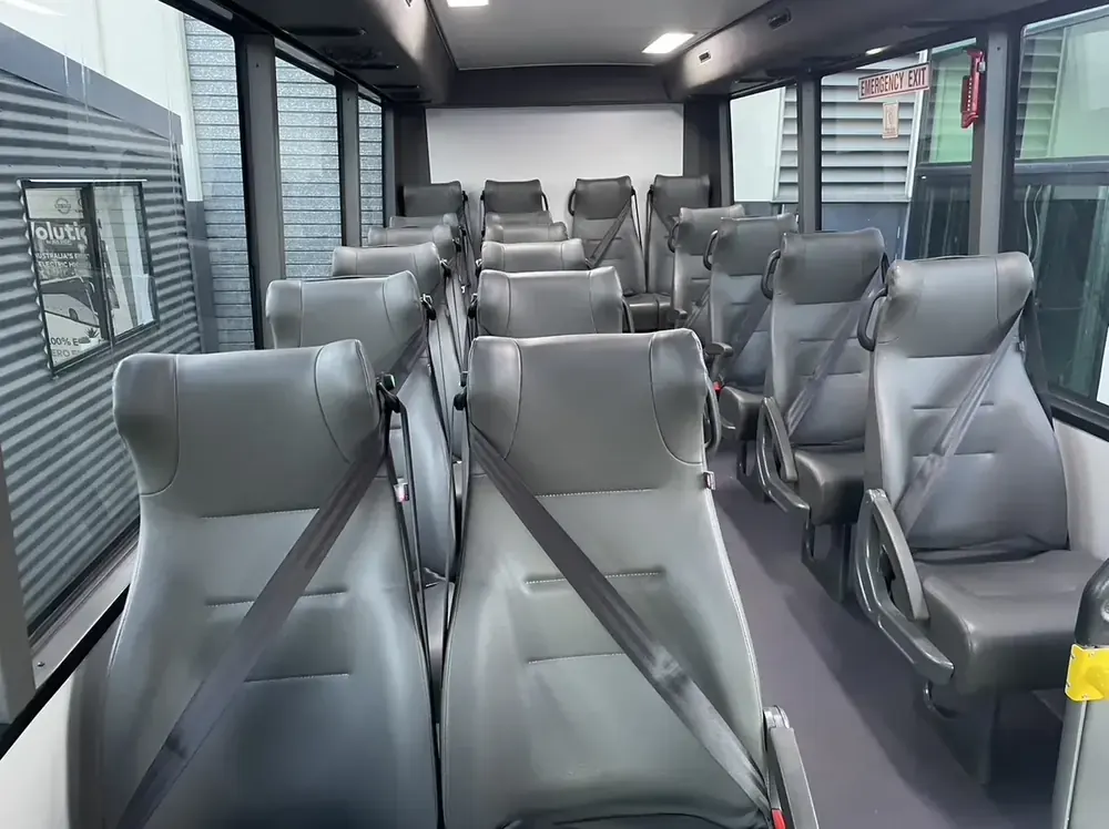 I-Bus interior — durable trim with 3-point belts throughout