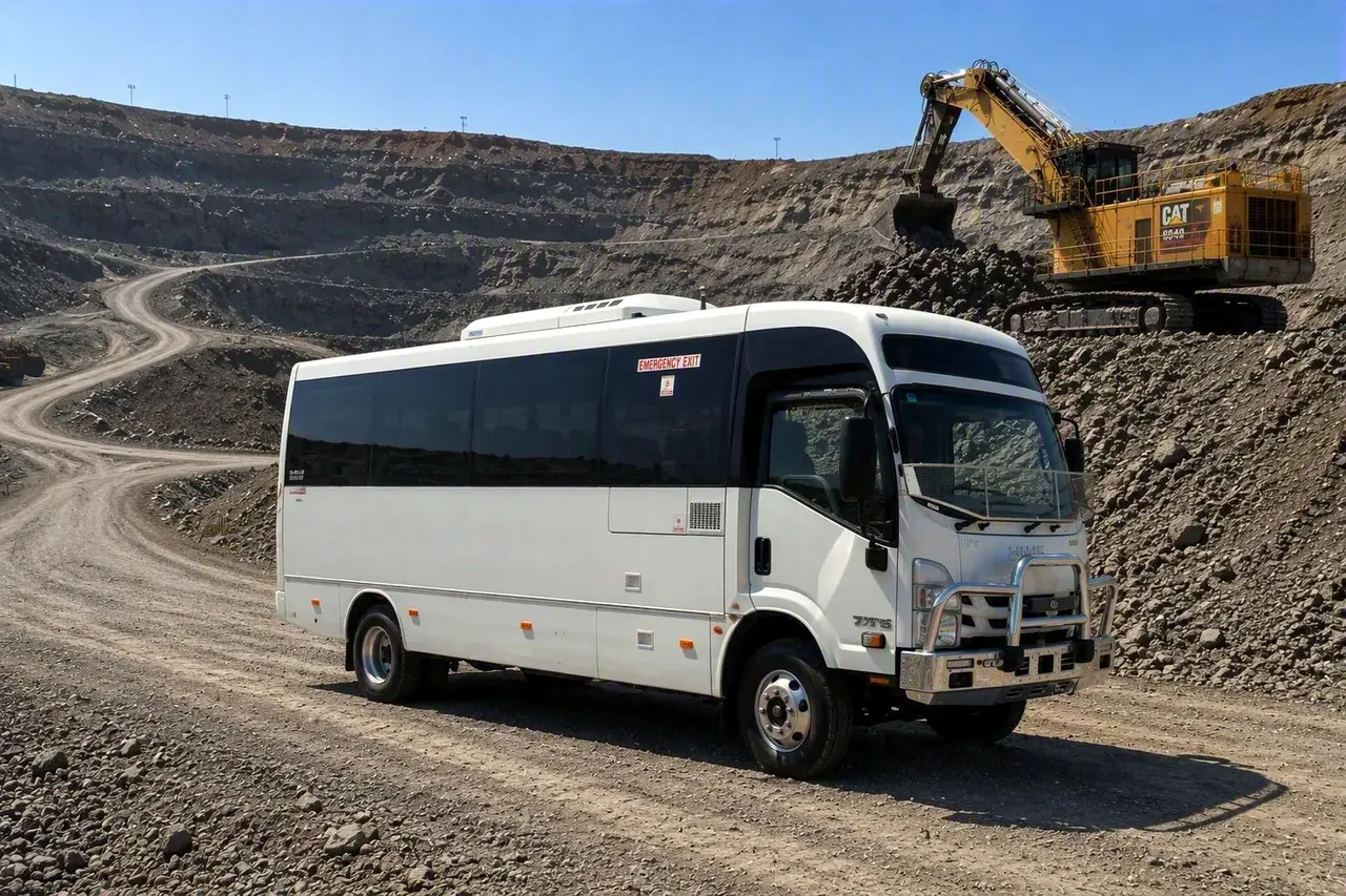 I-Bus NPS 4×4 mine-spec bus working an open-cut mine site